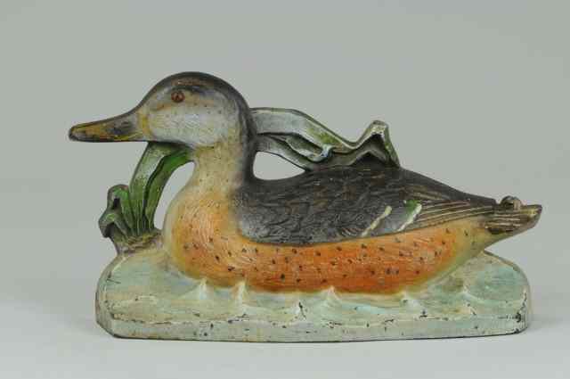 Appraisal: MALLARD DOORSTOP Large mallard hen floating on water Great coloring