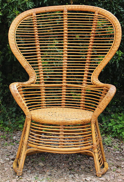 Appraisal: A VINTAGE BAMBOO AND CANED PEACOCK CHAIR with cerda label