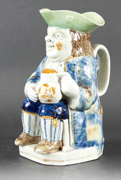 Appraisal: Staffordshire painted pearlware traditional toby jug early th century in