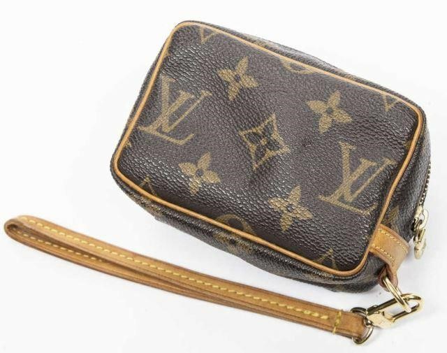 Appraisal: Louis Vuitton Trousse Wapity accessory pouch in brown and tan