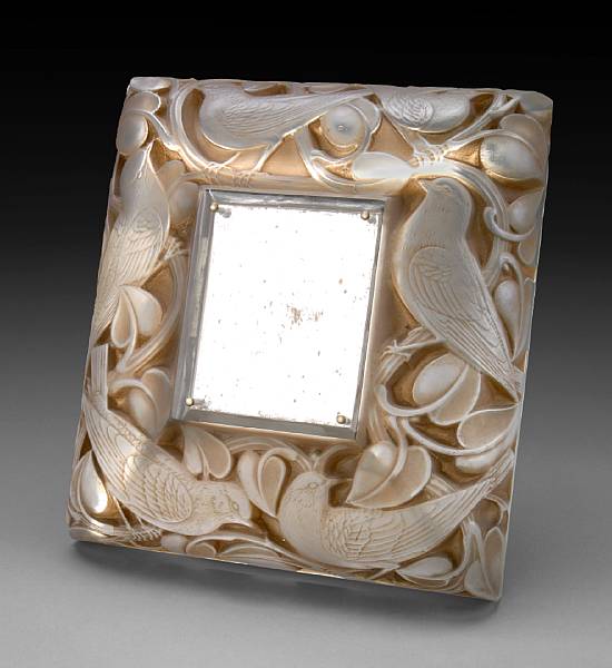 Appraisal: A Ren Lalique molded glass mirror Bergeronnettes Marcilhac model introduced