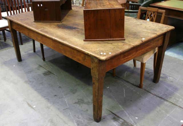 Appraisal: A late th century pine country kitchen table