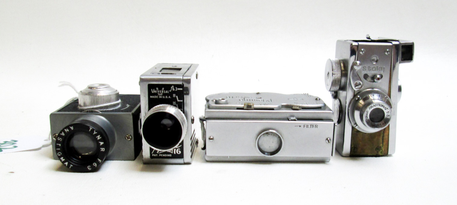 Appraisal: FOUR MINIATURE SPY CAMERAS Mamiya super with sliding lens cove