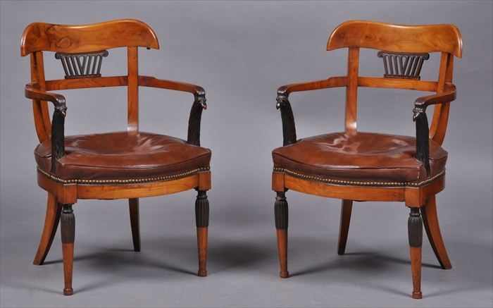 Appraisal: PAIR OF AUSTRIAN NEOCLASSICAL-STYLE WALNUT AND EBONIZED ARMCHAIRS Each stamped