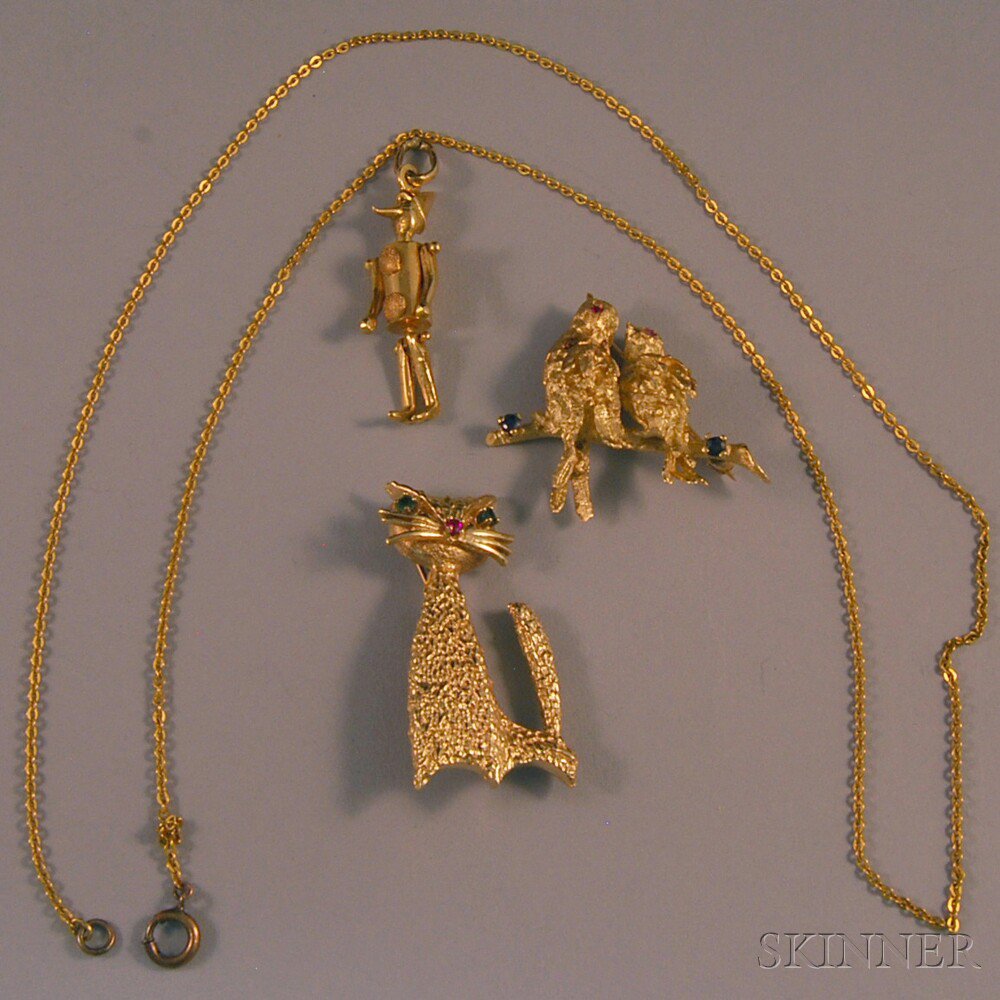 Appraisal: Three Pieces of Gold Jewelry a kt gold gem-set bird