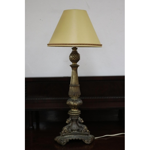 Appraisal: Large decorative lamp with griffin motif supports with shade unknown