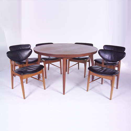 Appraisal: FINN JUHL NIELS VODDER Seven-piece teak dining set consisting of