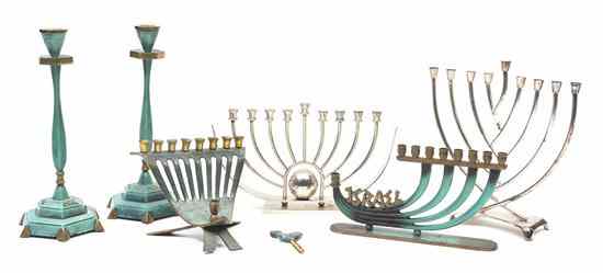 Appraisal: A Group of Mixed Metal Judaica Objects comprising four menorahs