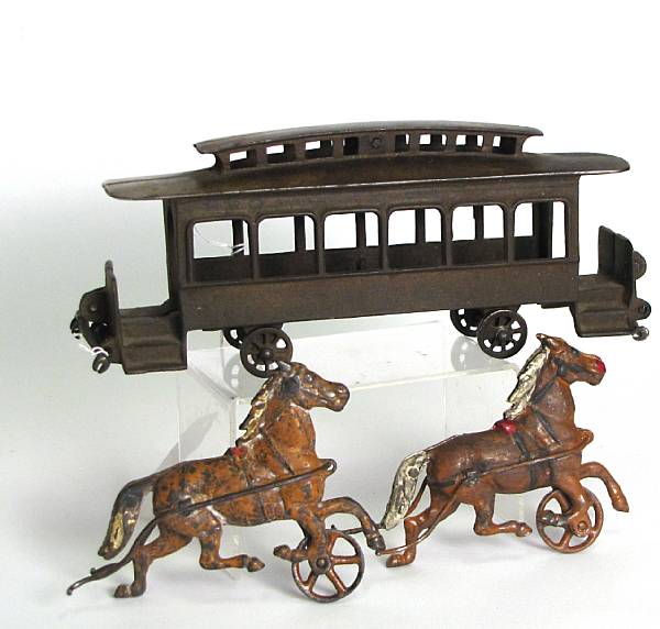 Appraisal: Horse-drawn Trolley Car An early cast iron trolley car pulled