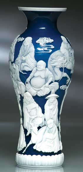 Appraisal: CARVED BEIJING GLASS VASE Very finely detailed and unusual tall