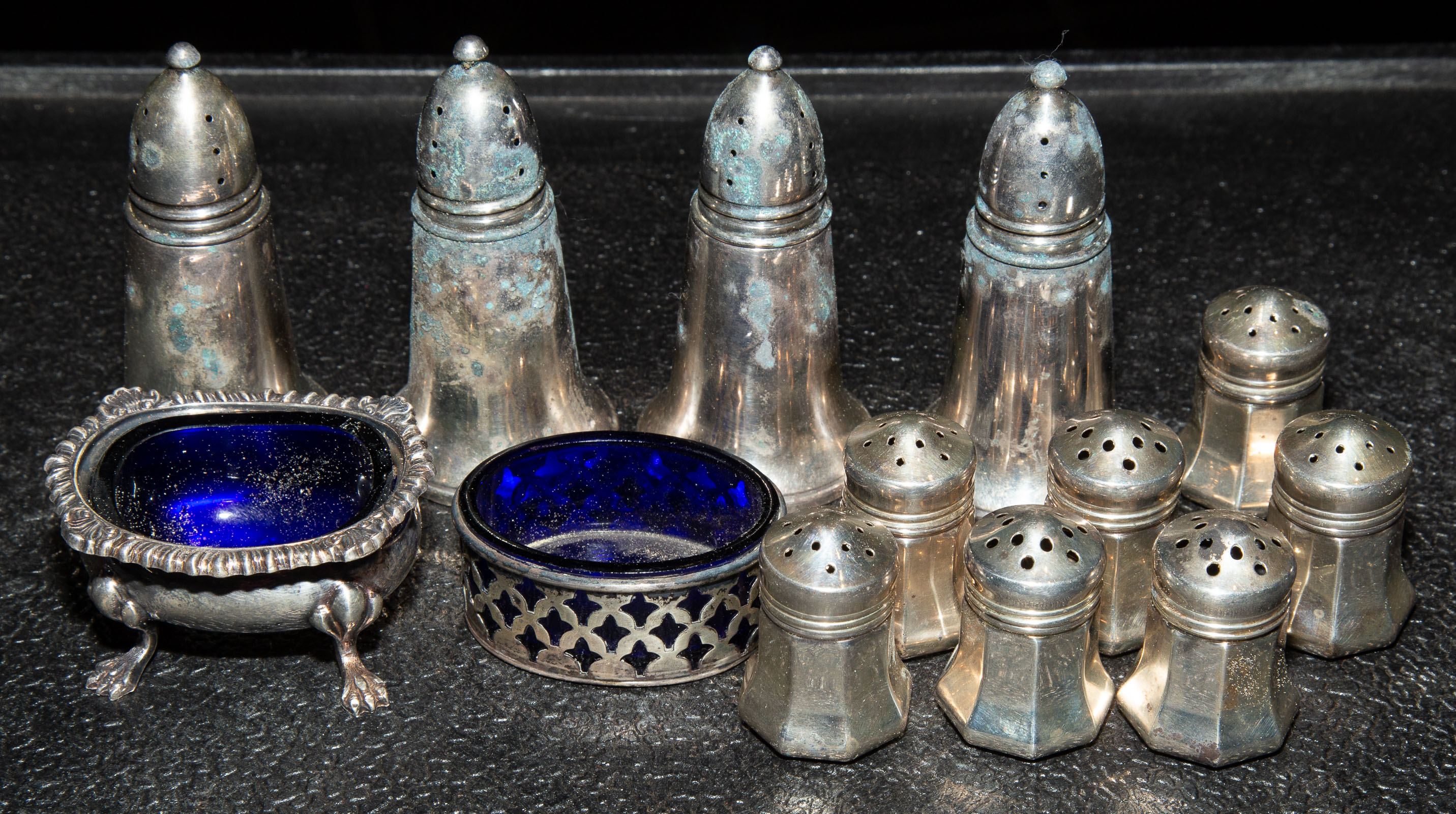 Appraisal: COLLECTION STERLING SALTS PEPPER CASTERS Including four weighted casters two