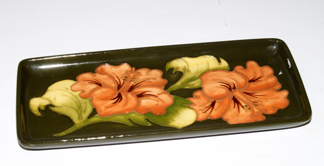 Appraisal: A Moorcroft pottery rectangular dish decorated in the Hibiscus pattern