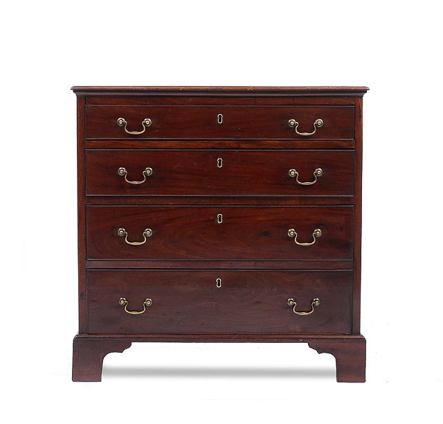 Appraisal: A GEORGIAN MAHOGANY CHEST WITH BRUSHING SLIDE OVER FOUR LONG