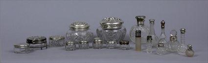 Appraisal: GROUP OF NINETEEN SILVER-MOUNTED CUT-GLASS DRESSING TABLE ARTICLES Comprising circular