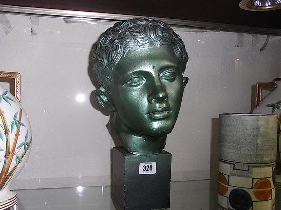 Appraisal: A ROMAN STYLE PLASTER HEAD on stand