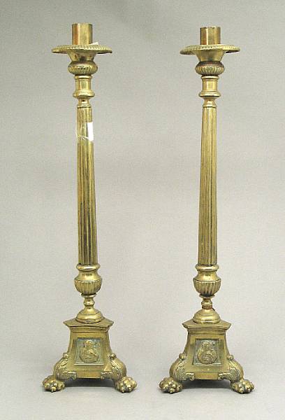 Appraisal: A pair of Italian brass altar candlesticks th century Each