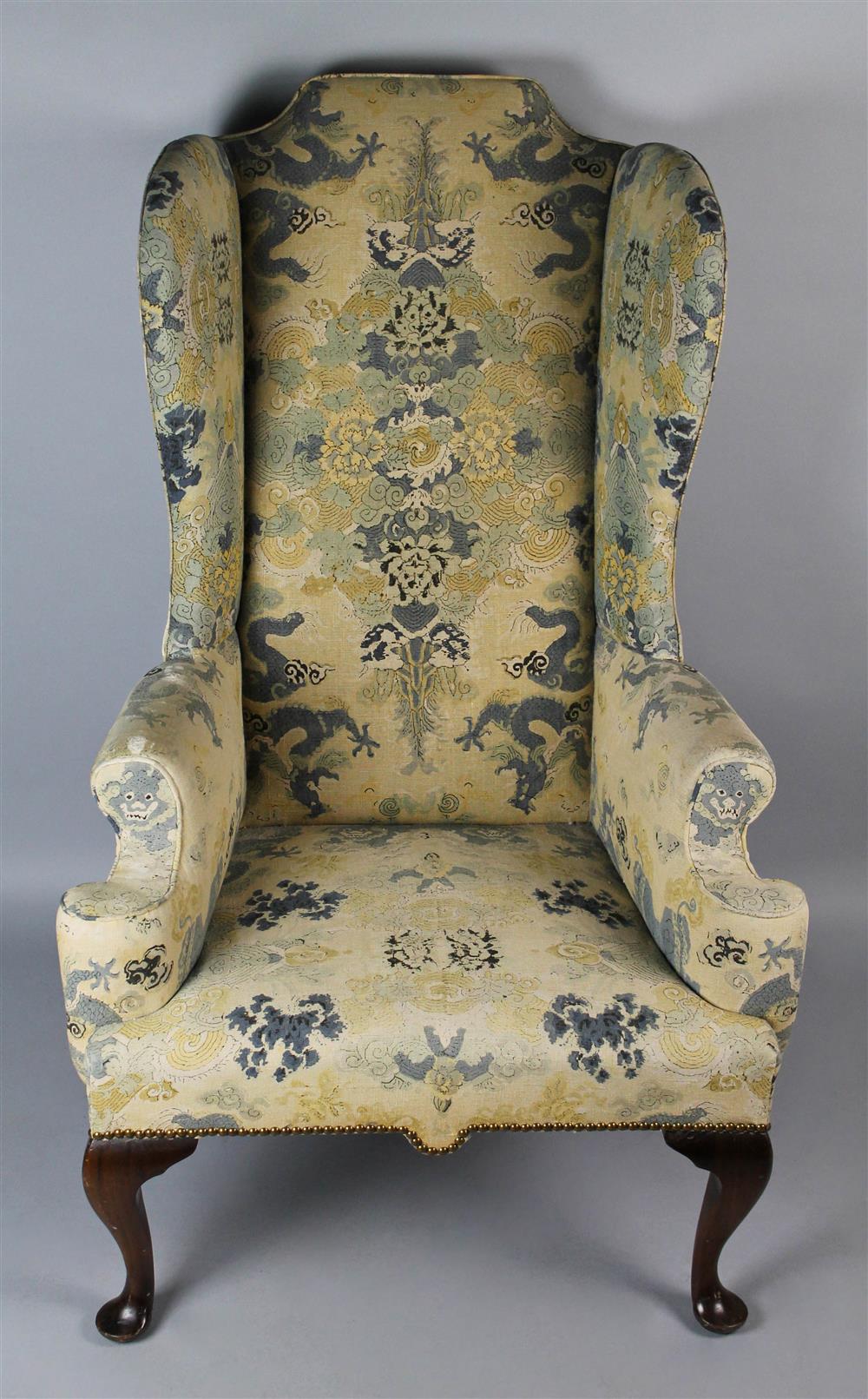 Appraisal: QUEEN ANNE STYLE MAHOGANY WING CHAIR having a shaped crest