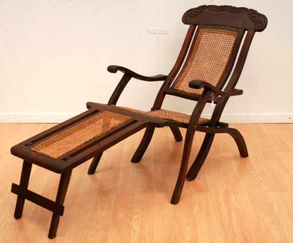 Appraisal: An early th century mahogany and cane deck chair