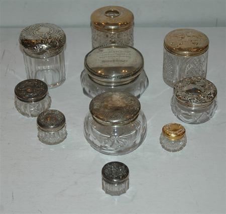 Appraisal: Group of Sterling Silver Mounted Cut Glass Dresser Bottles Estimate