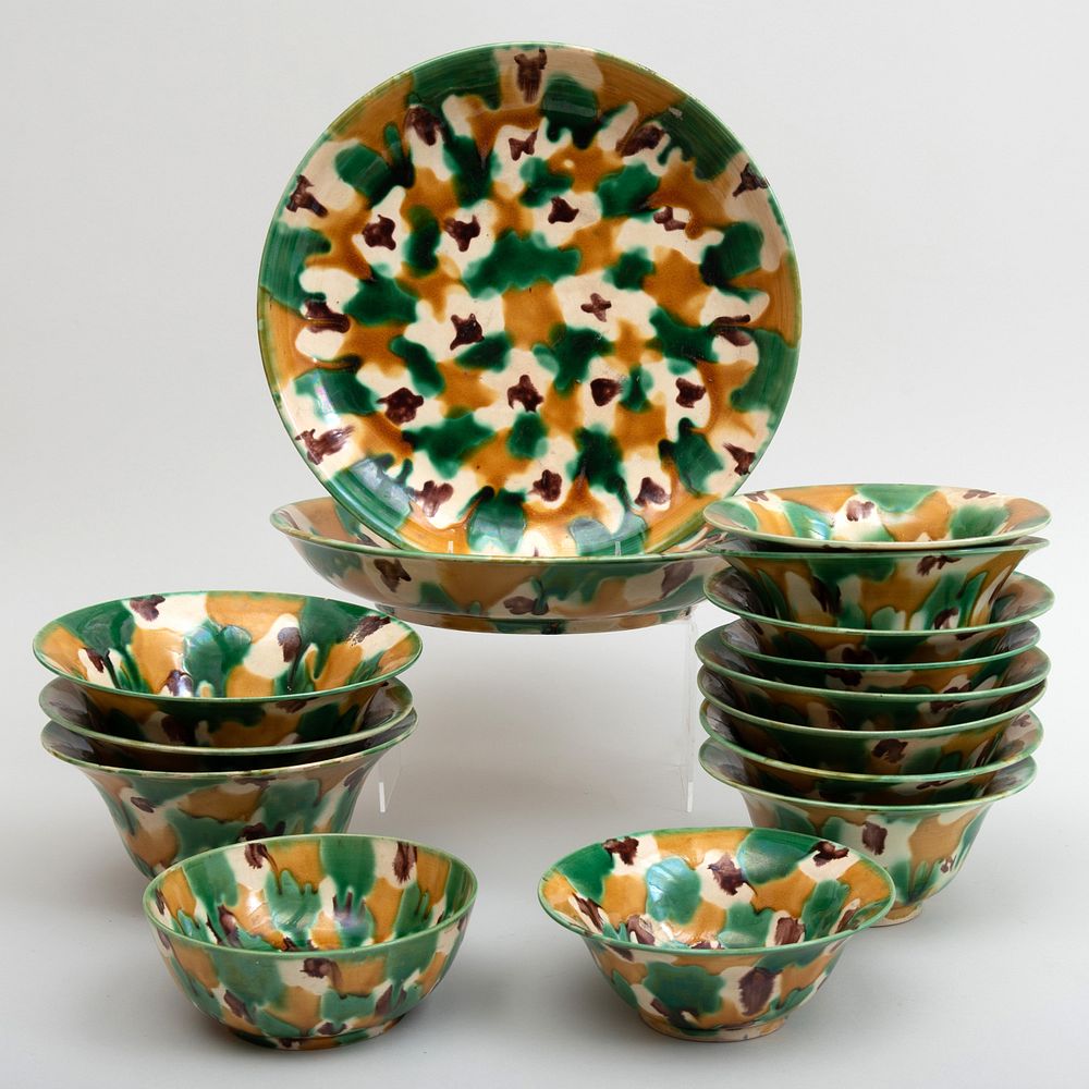 Appraisal: Group of Spatterware Pottery Dishes Comprising A pair of large