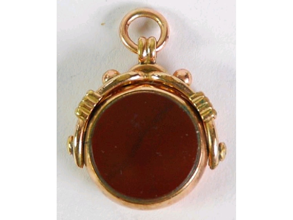 Appraisal: ANTIQUE REVOLVING FOB SEAL set with bloodstone and Cornelian