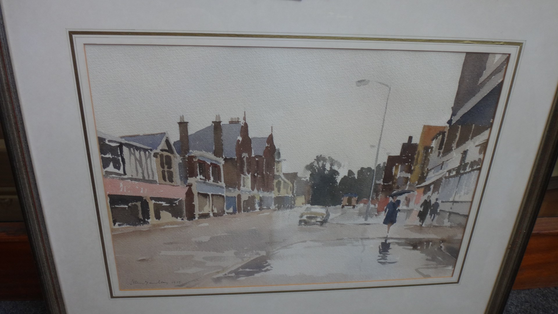 Appraisal: John Yardley b Street scene in rain watercolour signed and