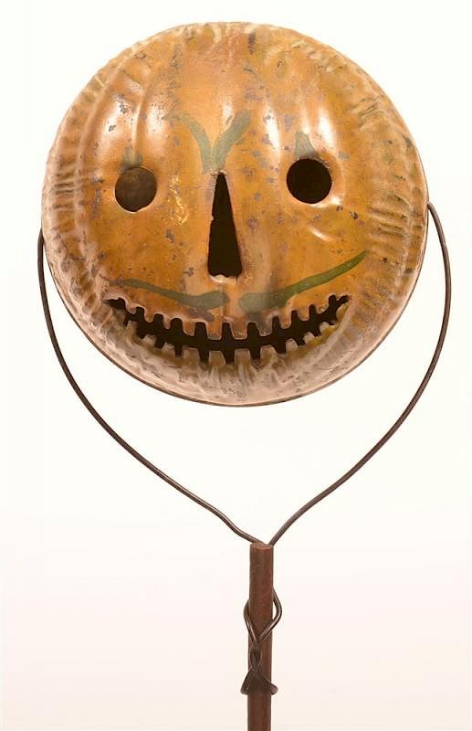 Appraisal: Tin Jack-O-Lantern Trick-or-Treat Parade Torch Early th Century Tin Jack-O-Lantern