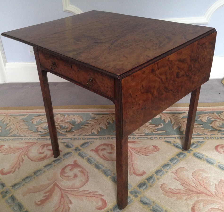 Appraisal: A George III yew wood Pembroke table with highly decorative