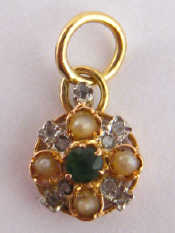 Appraisal: A yellow metal tests carat gold green garnet diamond and