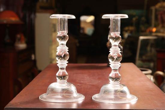 Appraisal: PAIR OF CLEAR GLASS CANDLESTICKS Marked with etched signature Steuben