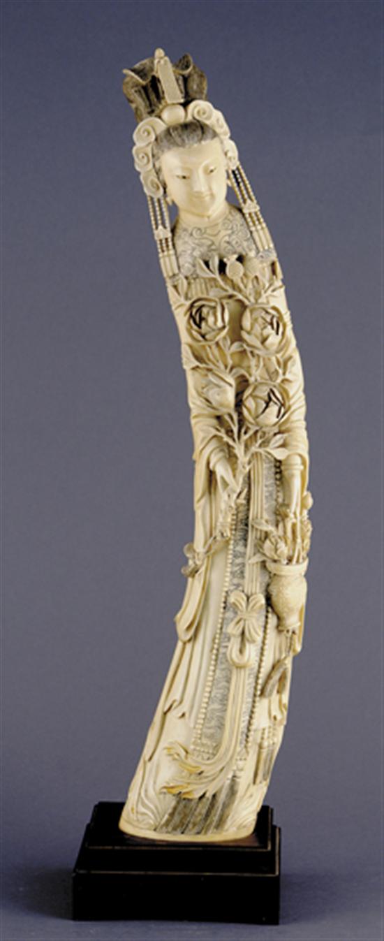 Appraisal: Chinese carved ivory tusk of female figure standing Quanyin with