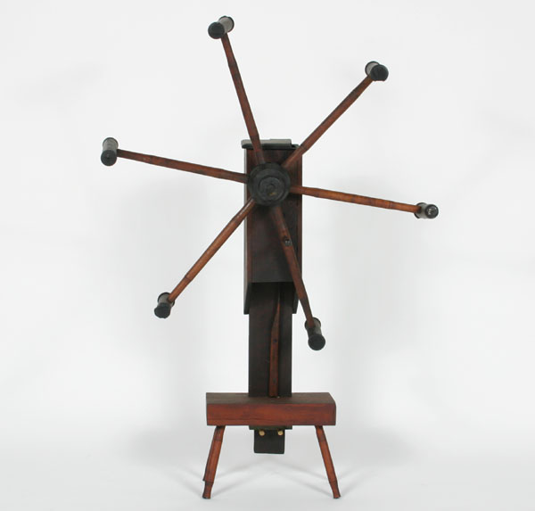 Appraisal: Six arm primitive yarn winder with four leg base old