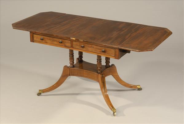 Appraisal: A Regency mahogany sofa table circa outlined with rosewood crossbands