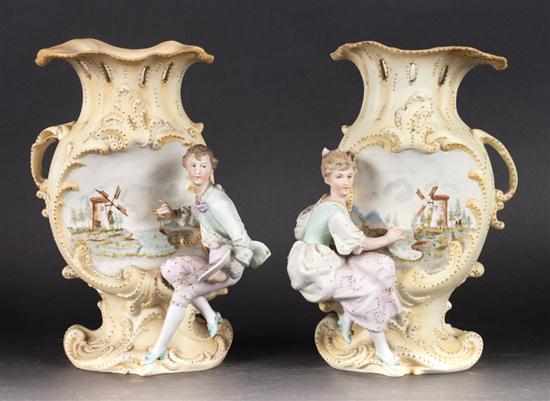 Appraisal: Pair of Rudolstadt painted bisque figural vases Estimate - All