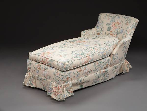 Appraisal: A peach chintz upholstered chaise lounge mid th century The