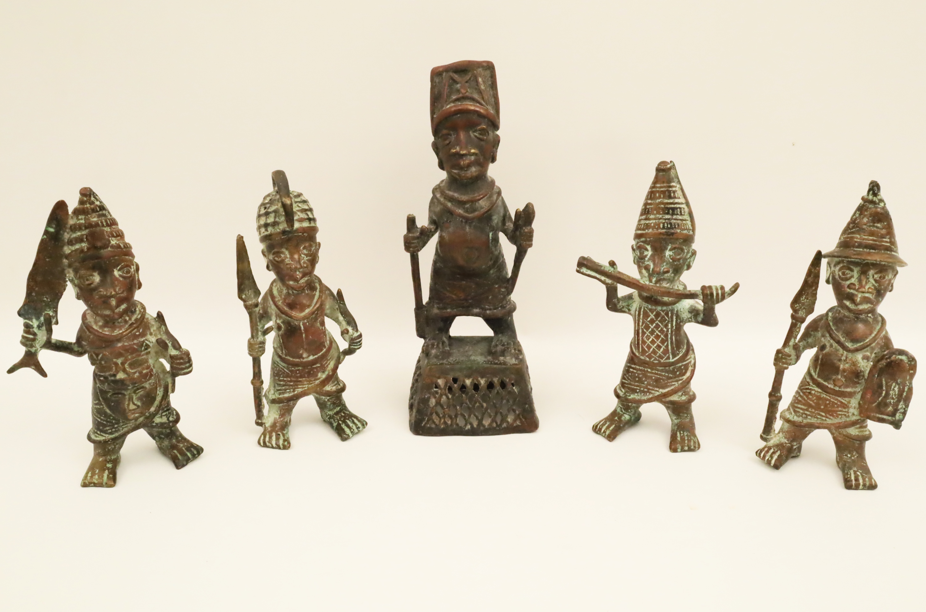 Appraisal: GROUP OF AFRICAN BRONZE FIGURES Including Benin warriors along with