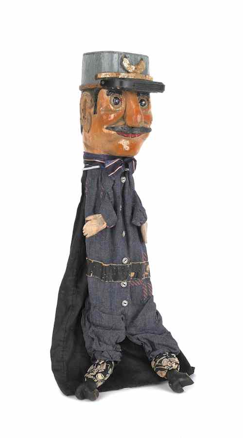 Appraisal: Carved and painted policeman puppet late th early th c