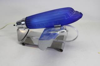 Appraisal: Art Deco Sarsaparilla Plane Form Lamp Art Deco Sarsaparilla Plane