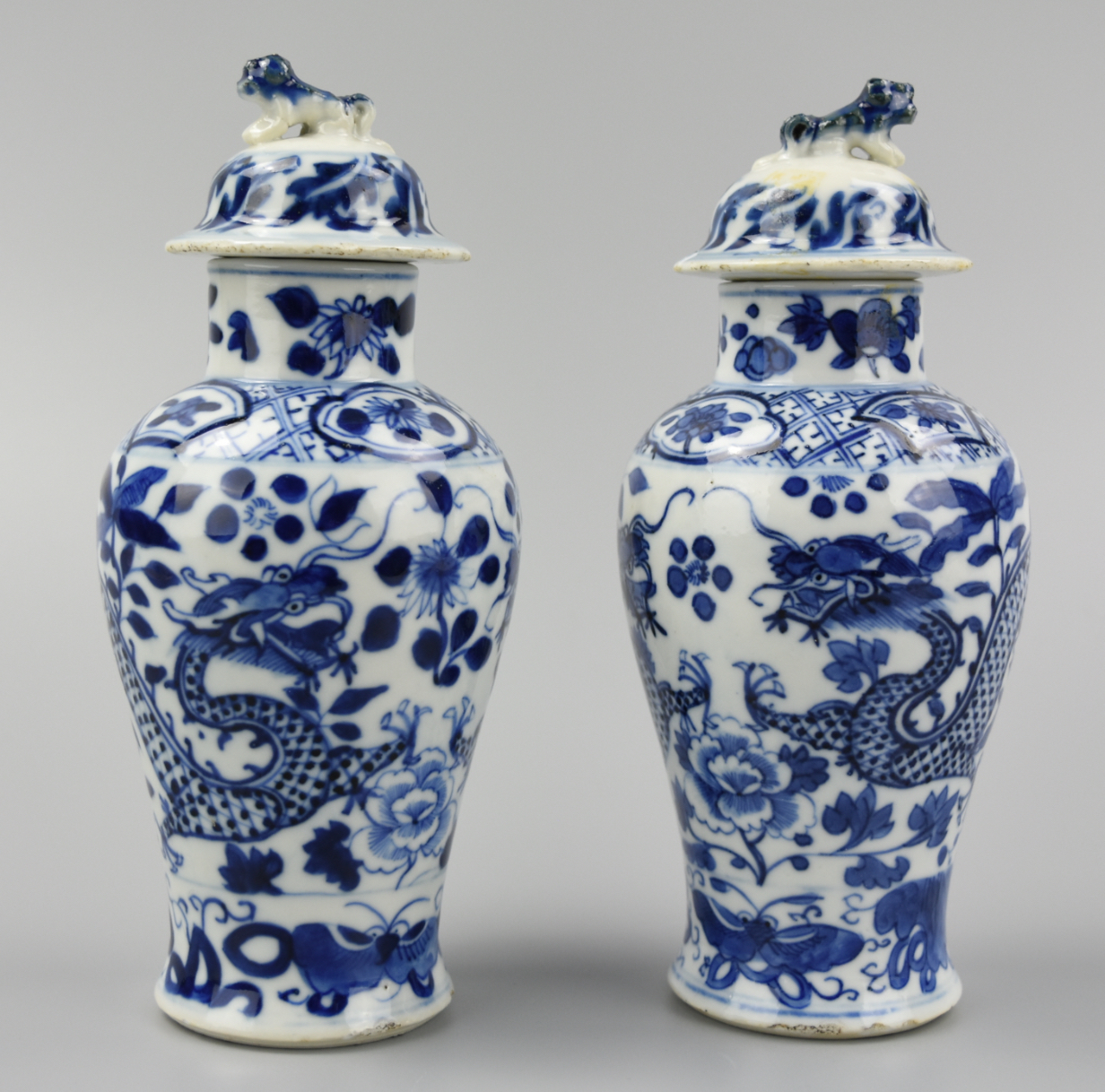 Appraisal: PAIR OF CHINESE B W DRAGON VASES COVER GUANGXU P