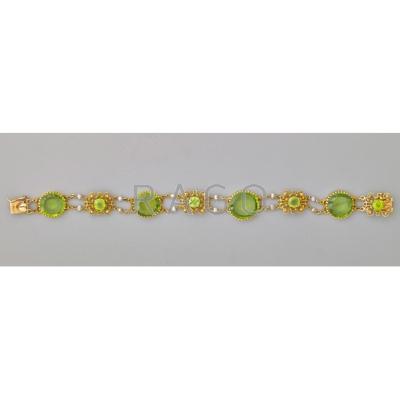 Appraisal: EDWARDIAN K GOLD PERIDOT AND SEED PEARL BRACELET Four faceted