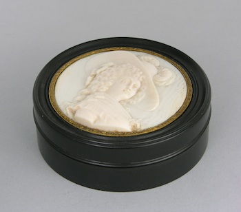 Appraisal: A Fine Carved Ivory and Ebonized Wood Master Snuff Box