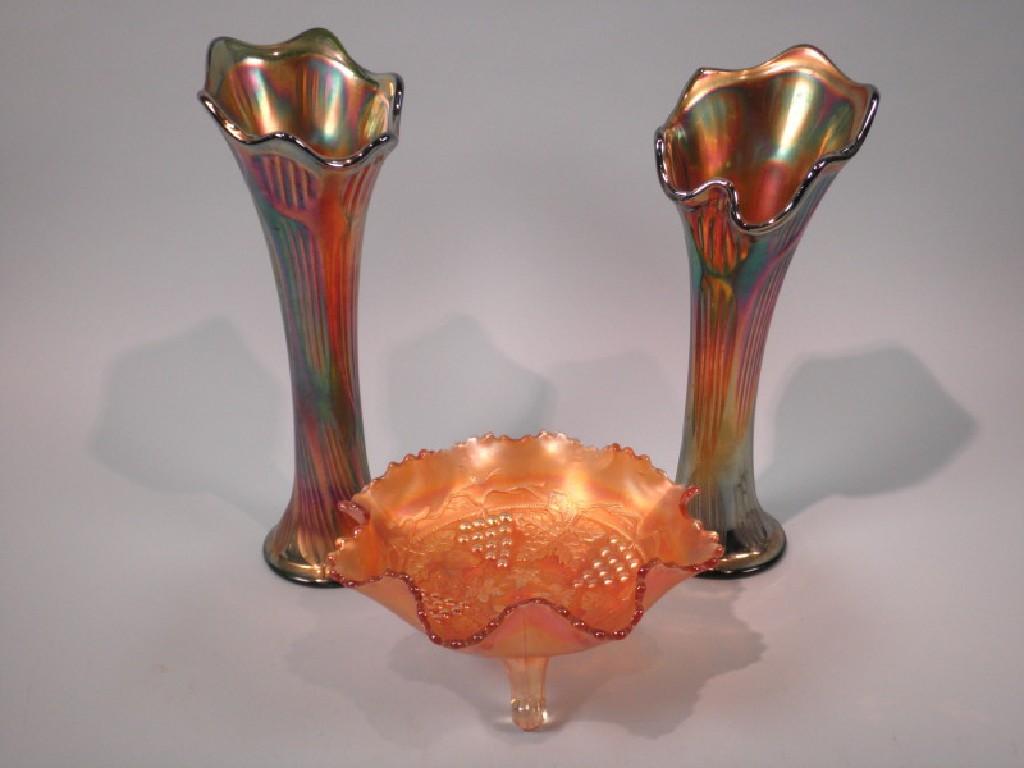 Appraisal: Two similar blackcurrant coloured carnival glass vases and a bowl