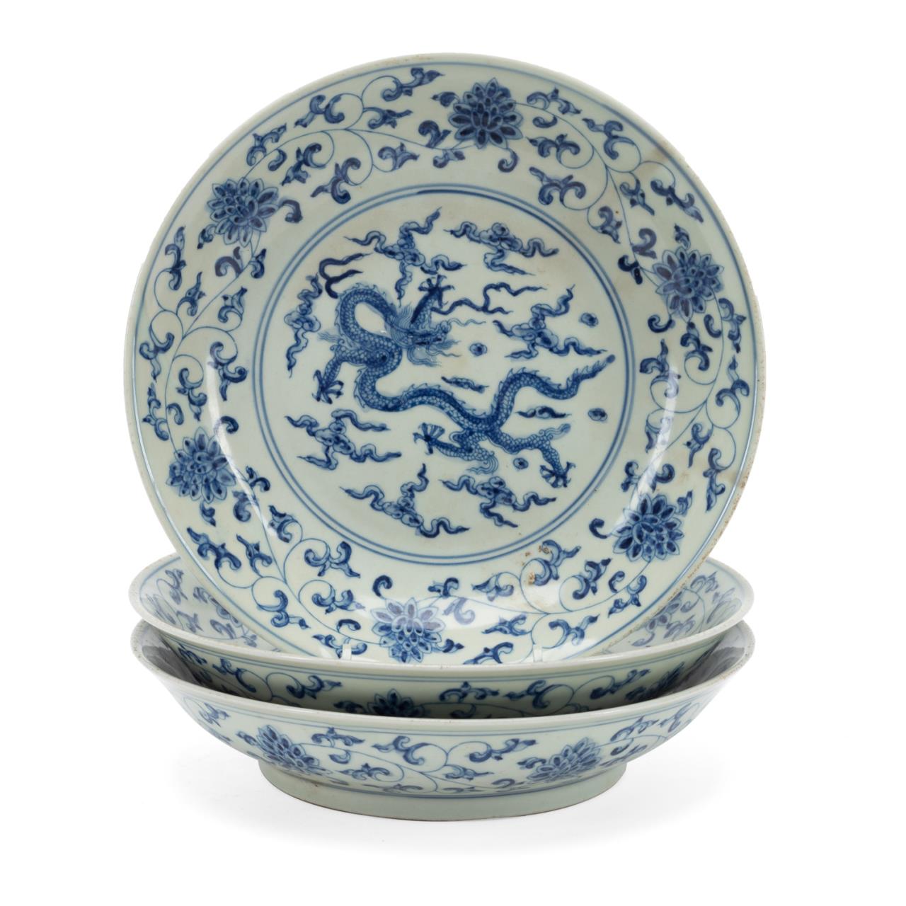 Appraisal: CHINESE MING STYLE BLUE WHITE DRAGON BOWLS Three Chinese Ming