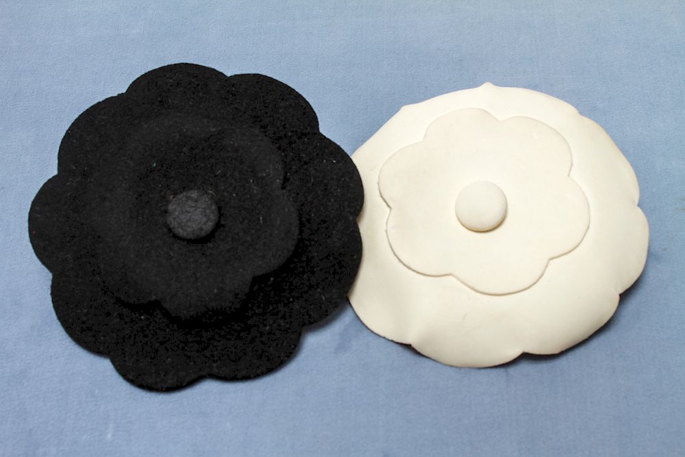 Appraisal: Chanel Vintage Camellia Flower Brooches Two Chanel vintage stylized camellia