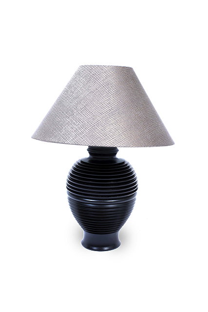 Appraisal: AN EBONISED TURNED WOODEN TABLE LAMP of ovoid form and