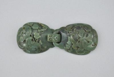 Appraisal: A Carved Jade Dragon Buckle Two carved interlocking pieces both