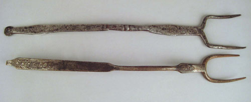 Appraisal: Two wrought iron flesh forks dated and