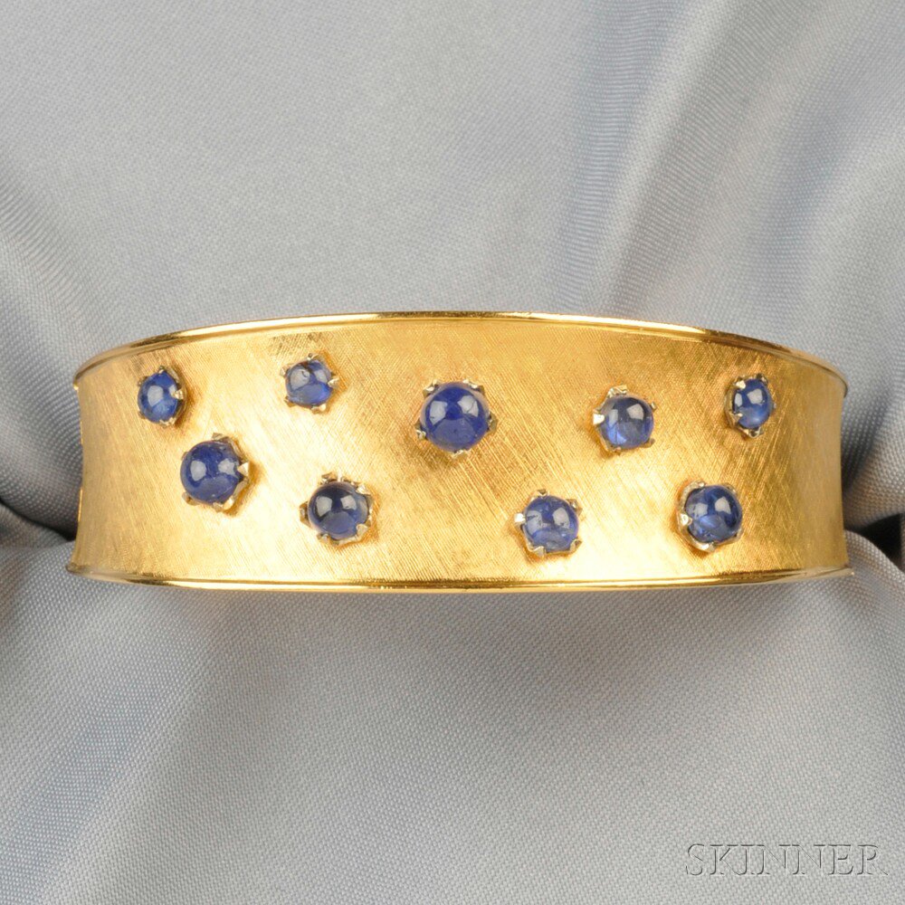 Appraisal: kt Gold and Sapphire Bracelet designed as a hinged cuff