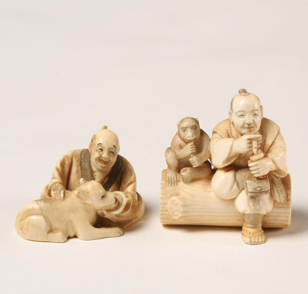 Appraisal: Lot of Japanese carved ivory netsuke man with dog and