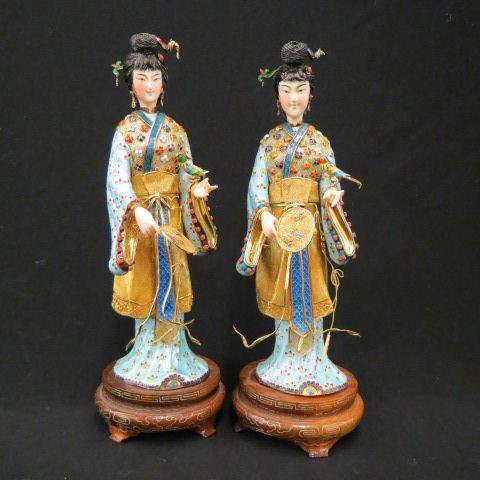 Appraisal: Pair of Chinese Enameled Silver Ivory Figurineslady with bird fan